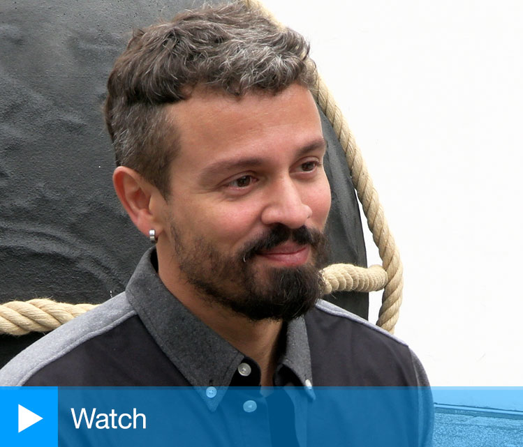 Jonathas de Andrade talking to Studio International at the Brazilian Pavilion, Venice Biennale 2022. Photo: Martin Kennedy.