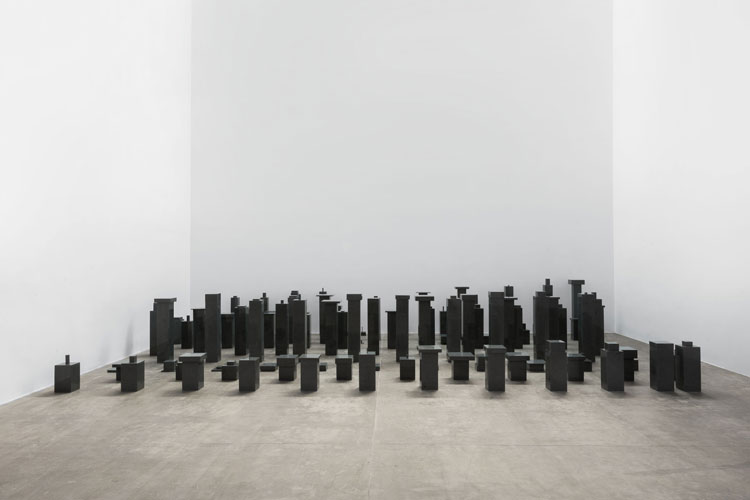 Not Vital. 100 Architects, 2016. Black granite, dimensions variable, average height 56.22 cm. Image © Not Vital. Courtesy of the artist and Hauser & Wirth.
