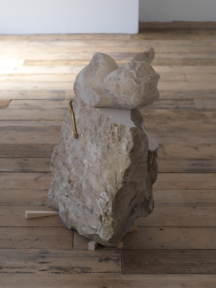 Danh Vo, Untitled, 2018. Marble Eros (Western Europe, 2nd century), sandstone eagle (Germany, late 19th century), brass, chromogenic print. Installation view at South London Gallery, 2019. Courtesy the artist. Photo: Nick Ash.