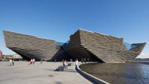 Kengo Kuma has delivered a new landmark in the V&A Dundee. It is a craggy sculptural structure inspired by the city’s shipbuilding past and Scotland’s rugged cliffs, which Kuma hopes will reconnect the city with nature. Inside, he has crafted an interior of warmth and welcome. But has he delivered a ‘living room for the city?’