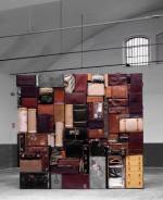 Fabio Mauri. Il Muro Occidentale o del Pianto (Mauri Wailing Wall), 1993. Suitcases, bags, trunks, leather casings, canvas, wood, 400 x 400 x 60 cm. La Cartaia, Vaiano, 1998. Photograph: Claudio Abate.