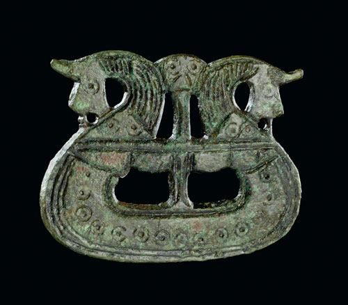 Brooch shaped like a ship, 800-1050. Tjørnehøj II, Fyn, Denmark.  Copper alloy. © The National Museum of Denmark.