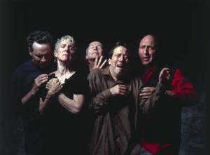 Bill Viola, The Quintet of the Astonished, 2000. Colour video rear projection 
        on screen mounted on wall in dark room. Projected image size: 140 x 240 
        cm. Bill Viola Studio, Long Beach, CA © Bill Viola. Photo: Kira Perov