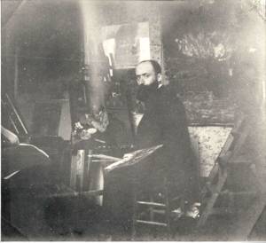 Édouard Vuillard in his studio at 56 Rue des Batignolles, Paris, c1898. Private collection.