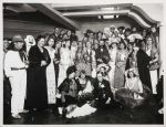 Marc Louis René Vaux. Masked Ball for the Thirtieth Anniversary of the B. Weill Gallery, December 13, 1931. (Berthe Weill seated in a tuxedo at the center). Photograph, 15.8 × 20.5 cm. Marianne Le Morvan Collection – Berthe Weill Archives (gift of Antoinette Karlinsky). © photo: Musée d’Orsay / Allison Bellido / © Centre Pompidou - MNAM / CCI - Bibliothèque Kandinsky.