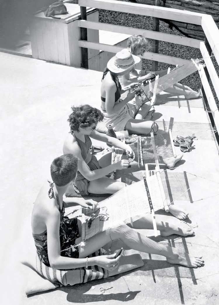 Students weaving on backstrap looms at Black Mountain College, 1945. Photograph by John Harvey Campbell, Western Regional Archives, State Archives of North Carolina.