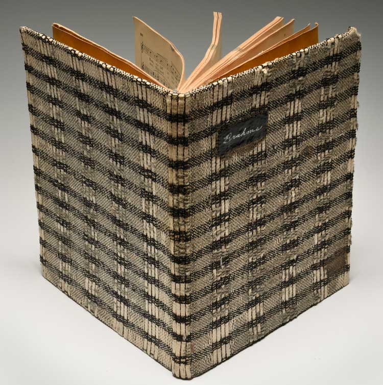 Janet Heling Roberts, Bookbinding: Johannes Brahms: Fifty Selected Songs, c1945. Paper, thread, and handwoven bookcloth, 12 x 10 x 1 1/8 in. Collection Black Mountain College Museum + Arts Center.