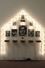 Christian Boltanski. Monument, 1989. Photographs, tin, lightbulbs, sockets, and transformer, 104 x 90 in.  Joseph H. Hirshhorn Bequest Fund, 2002. Courtesy Hirshhorn Museum and Sculpture Garden. Photograph: Lee Stalsworth.