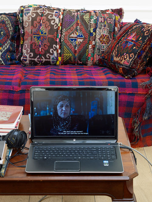 Bareth Alhomaam. Buzz, 2012. Video 14' 17". Installation view at the South London Gallery, 2014. Photograph: Andy Keate. Courtesy of the artist and RUYA Foundation.