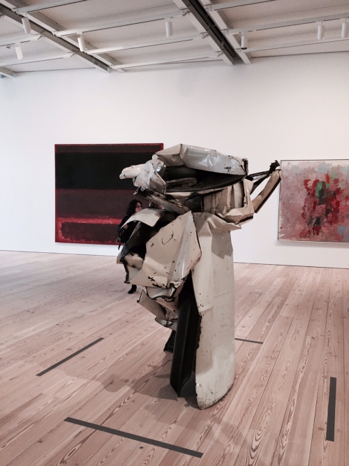 Exhibition view. John Chamberlain. Velvet White, 1962. Painted and chromium-plated steel, 79 1/2 × 52 3/4 × 58 1/4 in (201.9 × 134 × 148 cm). Whitney Museum of American Art, New York; Gift of the Albert A. List Family. Photograph: Miguel Benavides.