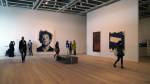 Whitney Museum. Installation view. Back: Chuck Close. Phil, 1969. Acrylic and graphite pencil on canvas, 108 1/4 × 84 in (275 × 213.4 cm). Whitney Museum of American Art, New York; Purchase, with funds from Mrs. Robert M. Benjamin. Photograph: Miguel Benavides.