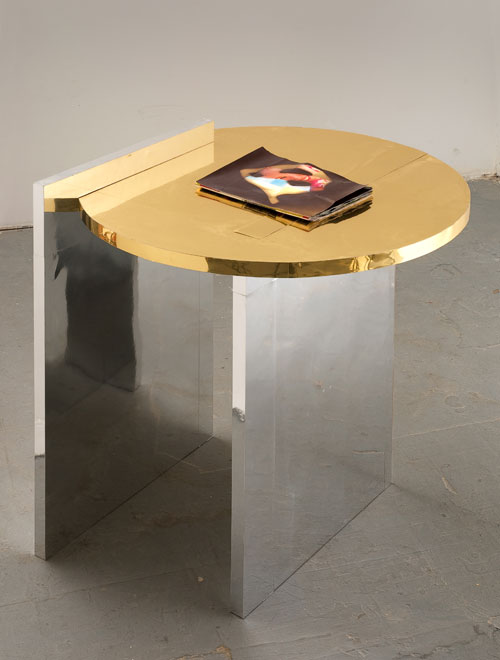 Alice Könitz. Magazine Table, 2008. Wood, metallic paper and inkjet prints, 32 x 33 x 32 in (81.3 x 83.8 x 81.3 cm). Collection of the artist. Courtesy Susanne Vielmetter, Los Angeles Projects, Los Angeles .