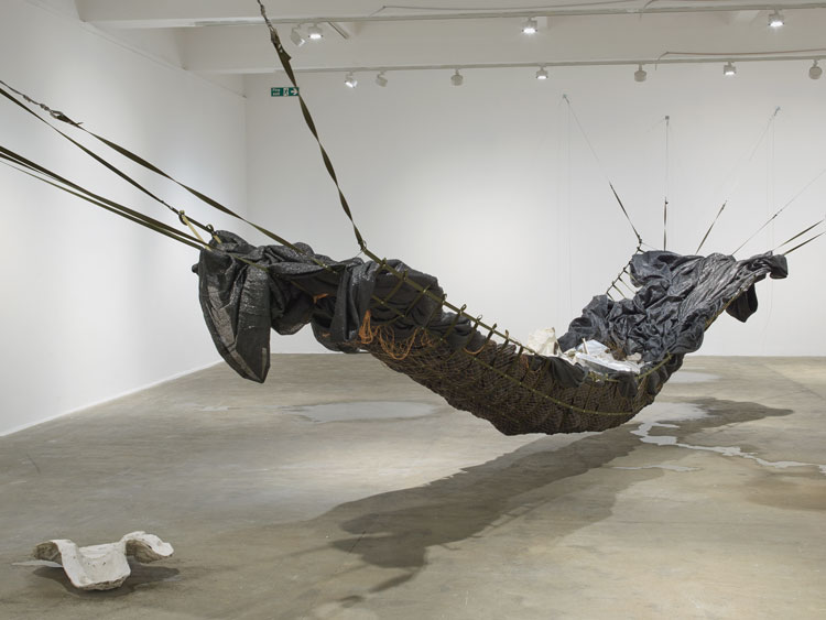 Yu Ji. Jaded Ribs, 2019-21. Rope, fishnet, fabric, breeze-block, plasterboard, metal, wax, cement. Photo: Andy Keate.