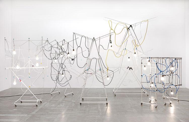 Haegue Yang. Non-Indépliables, nues, 2010-20. Drying racks, light bulbs, cable, zip ties, terminal strips. Courtesy of the artist. Photo: Nick Ash.