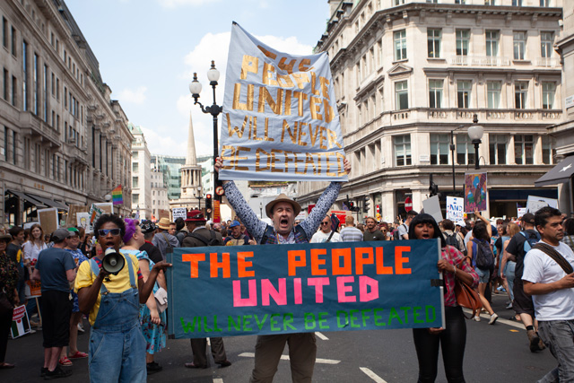 Mwiinga Twyman, Jake Goode and Kamby Kamara at the anti-Trump protest in London during the filming of Here for Life (2019). Photograph: Marc Hankins.