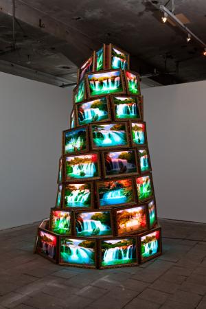Goran Hassanpour. Tower of Babel, 2011. Three metres high tower made out of light-boxes. Photograph: Vegard Kleven.